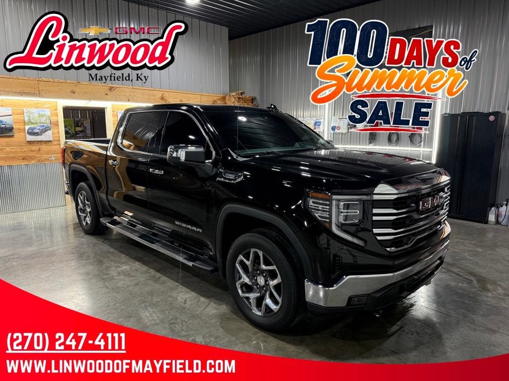 2024 GMC Sierra 1500 SLT in Onyx Black — front three-quarter view