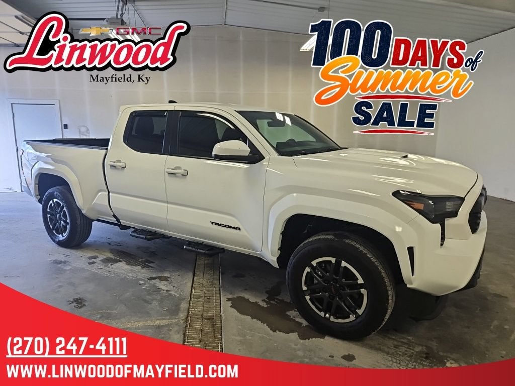 2026 Toyota Tacoma 4WD SR5 in White — front three-quarter view